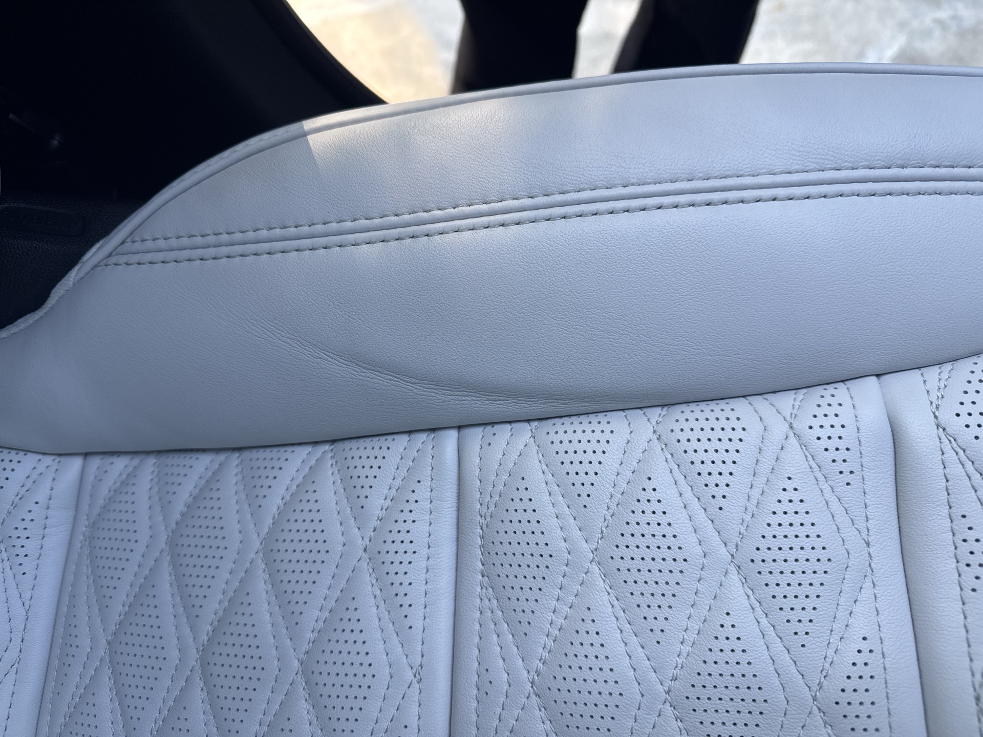 William Mobile Detail — Leather Restored