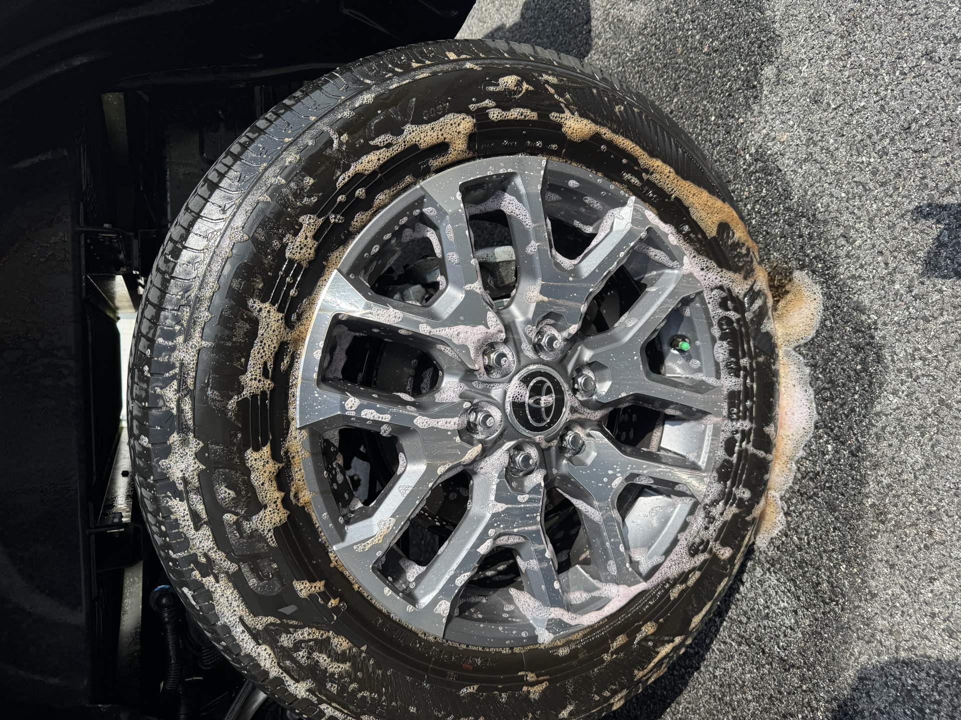 Wheel and tire mid-decontamination with iron remover